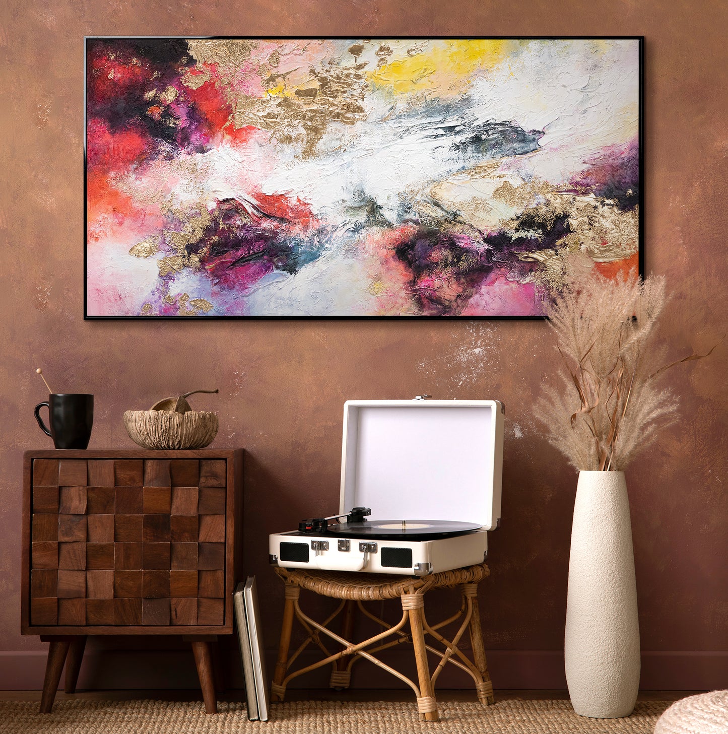 black framed abstract canvas art in living room